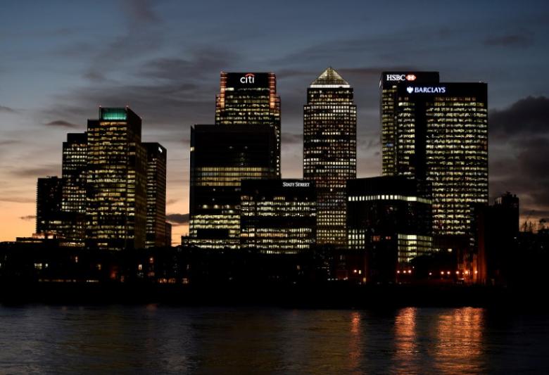 FILE PHOTO: The Canary Wharf financial district is seen at dusk in London